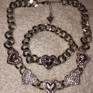 A guess bracelet/necklace set